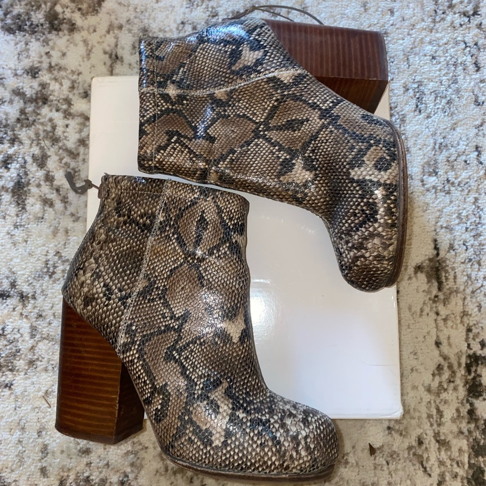 ALDO Snake print boots.